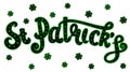 Hand lettering `St. Patrick`s` and a clover leaf. Calligraphic green letters on a white background. Royalty Free Stock Photo