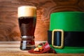 St.Patrick green hat, beer glass and gold Royalty Free Stock Photo