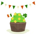 St. Patrick`s cupcake with shamrock clover and the flag of Ireland. Flat cartoon vector illustration isolated