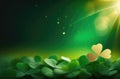 abstract green background, background with clover leaves, golden glow, place for text, bokeh effect, golden Royalty Free Stock Photo