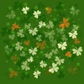 St. Patrick`s Day background. Clover leaves in colors of national flag of Ireland Royalty Free Stock Photo