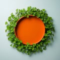 St Patrick\'s day copy space background. Clover leaves with circular orange frame