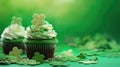 St. Patrick's Day cupcake with whipped cream decorated clover on green background.