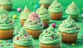 St Patrick\'s day, food and holidays concept. Close up of green cupcakes and bokeh