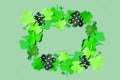 St. Patrick's Day frame background. Paper clover leaves on colored background with copy space Royalty Free Stock Photo