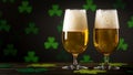 St. Patrick`s Day. Glass of Beer or Ale on wooden table and clover leaves bokeh Royalty Free Stock Photo