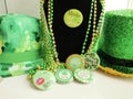 Green beads, hats, green buttons Irish expressions, green hats, St Patrick's day Royalty Free Stock Photo