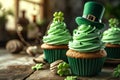 St.Patrick \'s Day. holiday cupcakes with green cream with clover and leprechaun hat