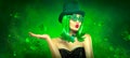 St. Patrick`s Day leprechaun laughing model girl pointing hand, holding product on green magic background