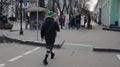 St. Patrick`s Day in Odessa. A young man in a kilt, striped socks Royalty Free Stock Photo