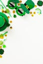 St Patrick`s Day party invitation template, poster, vertical banner mockup. Flat lay party glasses, leprechauns hat, drinking