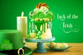 St Patrick`s Day theme lollipop candy land drip cake.