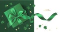 St Patrick`s day sale design template. Green gift box with clover leaves and golden coin confetti on green background.