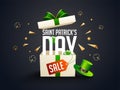 St. Patrick`s Day sale template or poster design with surprise gift box and leprechaun hat.