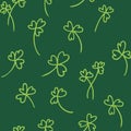St Patrick`s day seamless pattern design template. Outline green clover leaves on green background.