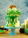 St Patrick`s Day candyland drip cake and party table.
