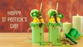 St Patrick`s Day on-trend holiday freak shakes with candy and lollipops.