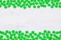 St Patricks Day background with green quatrefoils