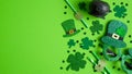 St Patricks Day banner design with Irish elf hats, pot of gold, shamrock leaf clovers, glasses on green background. Happy St. Royalty Free Stock Photo