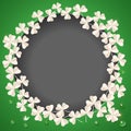 St. Patricks Day card. Wreath with white clover leaves on green background for greeting holiday design. Vector Royalty Free Stock Photo