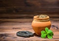 St Patricks day concept with pot full gold coins, horseshoe and Royalty Free Stock Photo