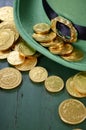 St Patricks Day leprechaun hat with gold chocolate coins Royalty Free Stock Photo