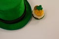 St Patricks Day leprechaun hat with shamrock on cupcake Royalty Free Stock Photo