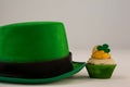 St Patricks Day leprechaun hat with shamrock on cupcake Royalty Free Stock Photo