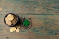 St. Patricks day, lucky charms. Horesechoe and shamrock on wooden background