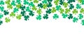 St Patricks Day paper shamrocks top border over white Royalty Free Stock Photo