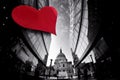 St Paul Cathedral against large heart on modern building during Valentine`s Day in London, UK