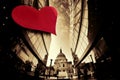 St Paul Cathedral against large heart on modern building during Valentine`s Day in London, UK