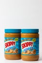 Two Jars of Creamy Skippy Peanut Butter Container and Trademark Logo