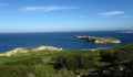 ST PAUL\'S BAY, MALTA - Feb 10, 2014: St Paul\'s Islands, off the coast of Malta, with a statue of St Paul on top, and fish farms