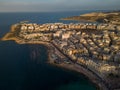 St Paul\'s Bay Malta at sunset high altitude aerial golden hour