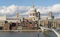 St. Pauls cathedral London and Millennium Bridge over River Thames Royalty Free Stock Photo