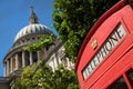 St Pauls cathedral with a red phone box Royalty Free Stock Photo