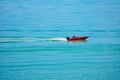 Couple having fun in bass boat in Gulf Coast Beaches.