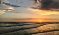 A beautiful sunset over the Gulf of Mexico is viewed from the beach at Treasure Island, Florida Royalty Free Stock Photo