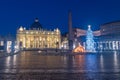 St. Peter Basilica with Nativity scene and Christmas tree at Christmas time in Vatican at night