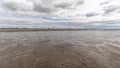 St. Peter BÃÂ¶hl beach with stilt houses in the background Royalty Free Stock Photo