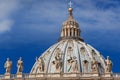 St Peter dome among clouds in Rome
