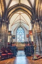 Altar with stained glass panel depicting various biblical figures inside the Town Church Royalty Free Stock Photo