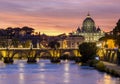 St. Peter\'s basilica dome and St. Angel bridge over Tiber river at sunset in Rome, Italy Royalty Free Stock Photo