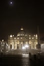 St. Peter`s Basilica at night with waxing gibbous moon, Vatican City, Rome, Italy