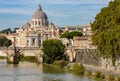 St Peter`s basilica in Vatican and St. Angel bridge over Tiber river in Rome, Italy Royalty Free Stock Photo