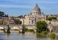 St. Peter`s basilica in Vatican and Victor Emmanuel II bridge over Tiber river in Rome, Italy Royalty Free Stock Photo