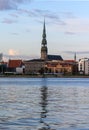 St. Peter\'s Cathedral in Old Riga view across the Daugava river 1 Royalty Free Stock Photo