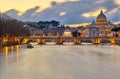 St. Peter`s cathedral and Tiber river at evening in Rome Royalty Free Stock Photo