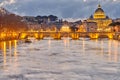 St. Peter`s cathedral and Tiber river at evening in Rome Royalty Free Stock Photo